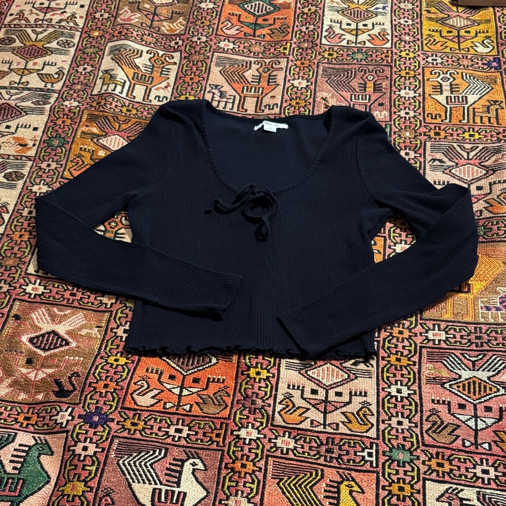 O'Neill Black Ribbed Long Sleeve Top, scalloped hem